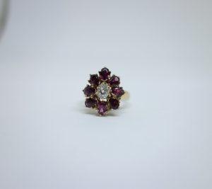 bague or et grenat avec diamant