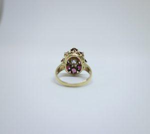 bague or et grenats avec diamant