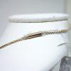 collier or 14ct et serpents