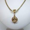 collier or 14ct et serpents