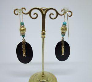 rare pendantes en or et onyx 1900