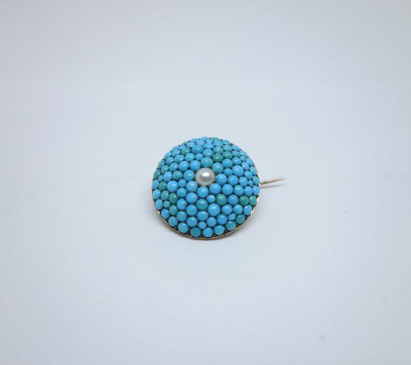 broche or et turquoises