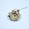 broche or et grenats