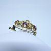 broche or et grenats