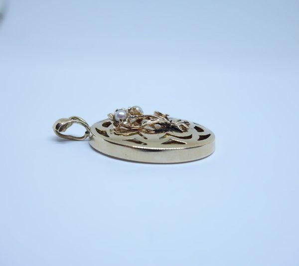 pendentif or ajouré perles fines