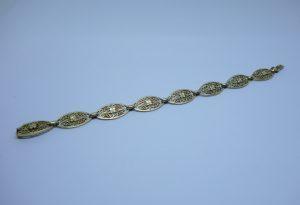 bracelet or maillon olive ajourés et motifs de fleurs