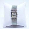 montre femme or gris et diamants signé Jack Sandoz