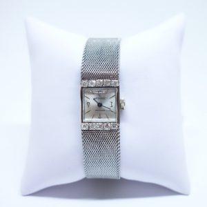 montre femme or gris et diamants signé Jack Sandoz