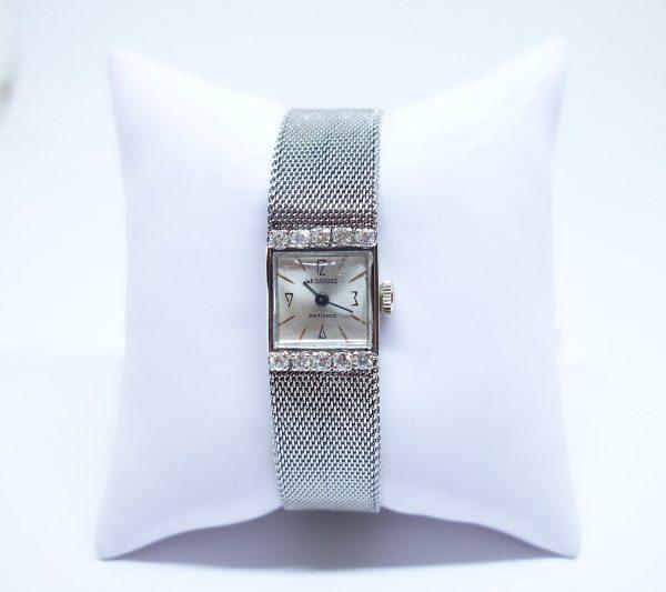 montre femme or gris et diamants signé Jack Sandoz