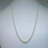 long collier en perles de culture et fermoir or
