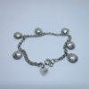 bracelet argent avec breloques coquillages