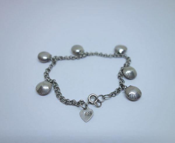 bracelet argent avec breloques coquillages