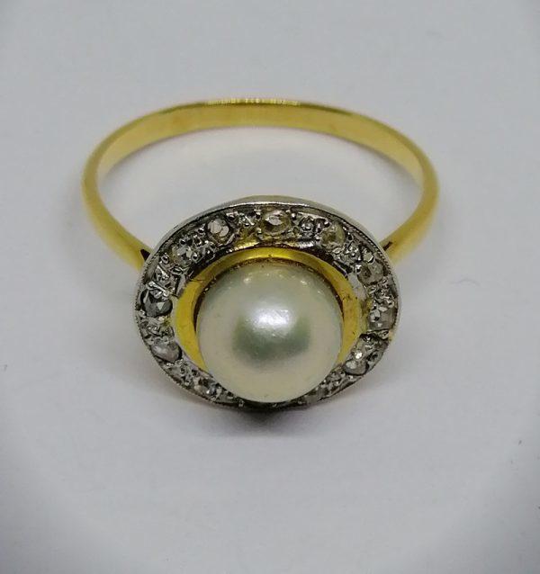 bague en or bicolore avec perle de culture et rose de diamants vers 1930