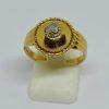 Bague or façon dôme et diamant
