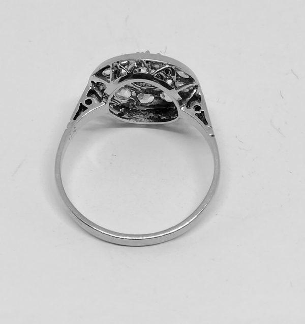 bague de forme ronde en or gris et platine avec diamants art déco vers 1930