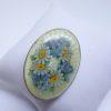 broche argent décor floral