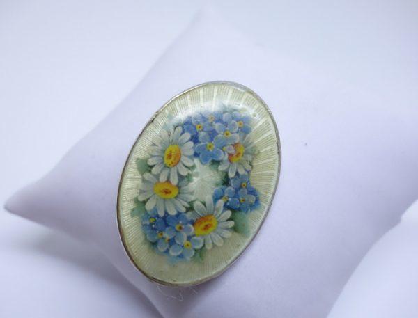 broche argent décor floral