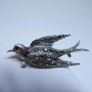 broche argent hirondelle et pierres