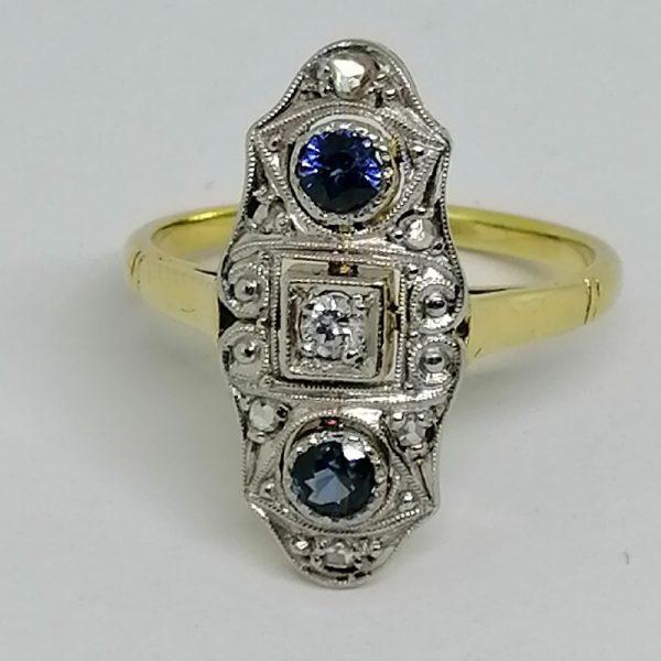 Bague or bicolore avec saphirs et diamants.