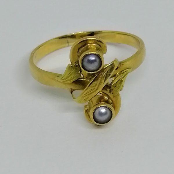 Bague en forme de huit bicolore.