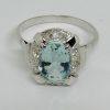 Bague or gris avec Aigue-marine et diamants.
