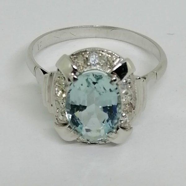 Bague or gris avec Aigue-marine et diamants.