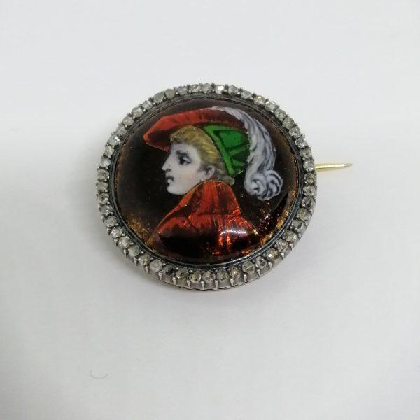 Broche ronde or/argent
