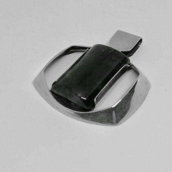 Pendentif argent ajouré forme géométrique.