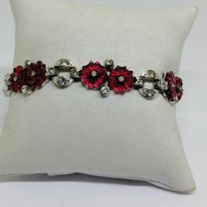 bracelet métal blanc et pâte de verre rouge et pierres blanches art déco 1930