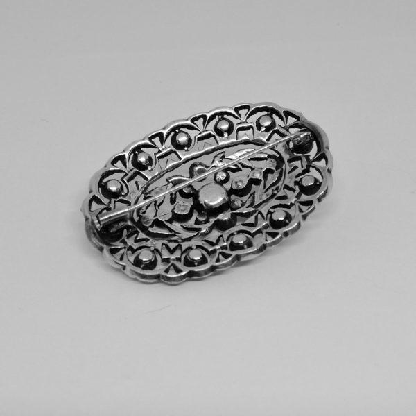 Broche argent ajourée pavé de cristal taillé époque 1900