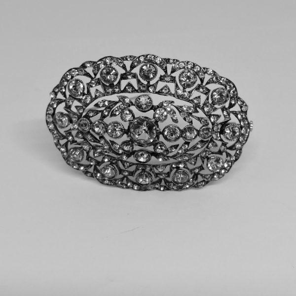 Broche argent ajourée pavé de cristal taillé époque 1900