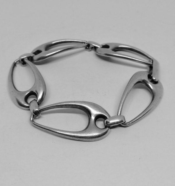 bracelet argent maillon ovale ajouré et courbe bijou français vintage vers 1960-70.
