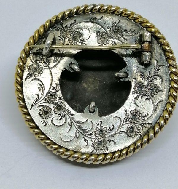 broche argent et vermeil avec tête d'enfant et sertie de grenats facettés vers 1870