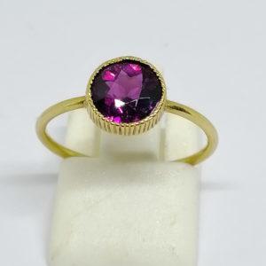 bague or avec grenat 1900