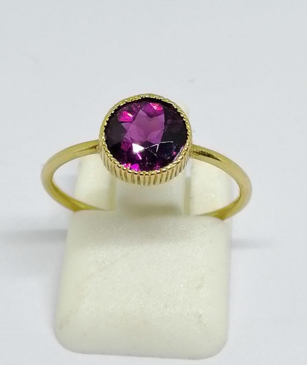 bague or avec grenat 1900