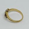 bague en or rose, avec opale, rubis et roses de diamants vers 1900