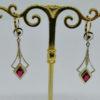 boucles d'oreilles en or bicolore pendantes art déco
