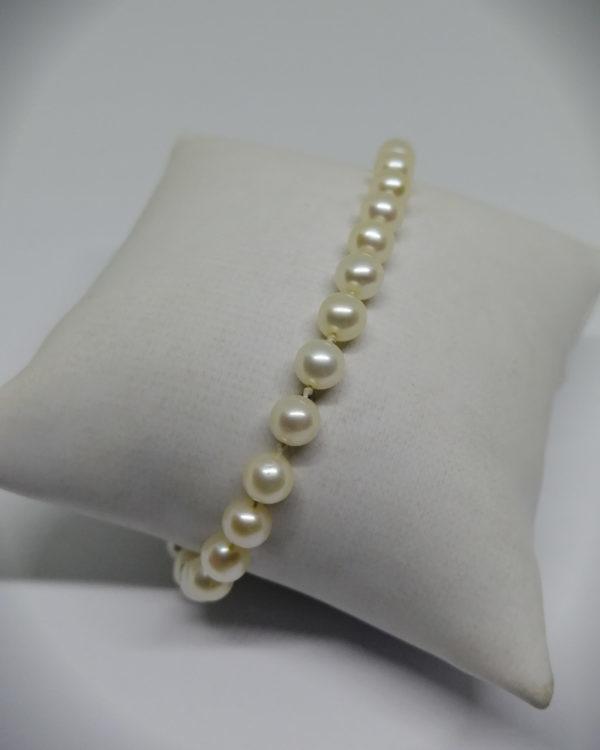 bracelet en perles de culture et fermoir menotte en or occasion