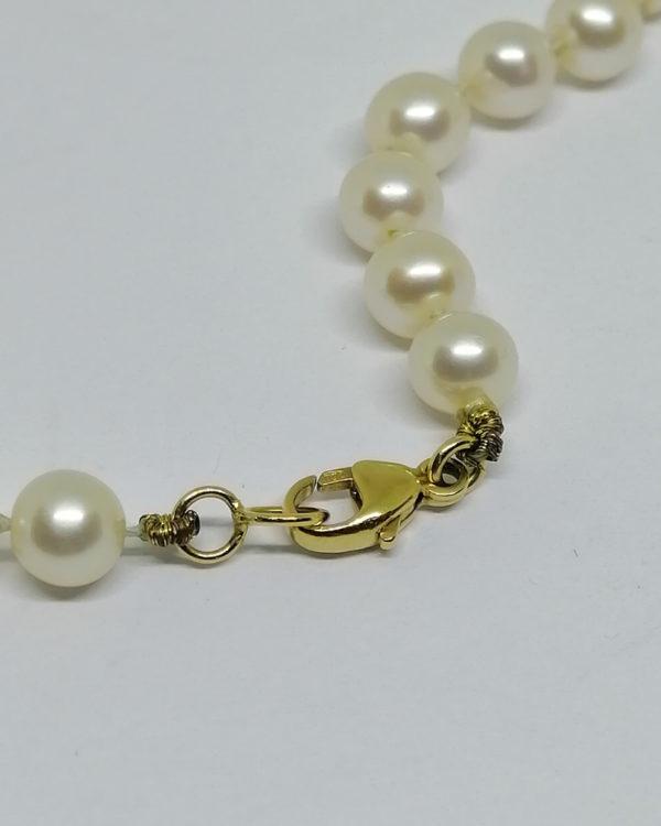 bracelet en perles de culture et fermoir menotte en or occasion