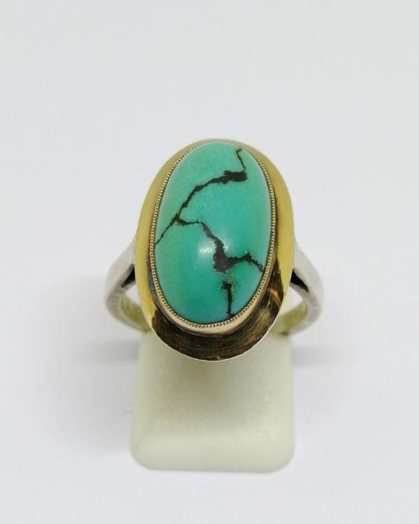 bague argent/or, avec cabochon de turquoise matrix vers 1925.