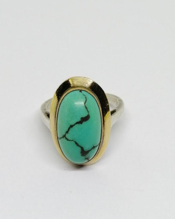 bague argent/or, avec cabochon de turquoise matrix vers 1925.