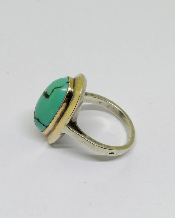 bague argent/or, avec gros cabochon de turquoise matrix vers 1925.