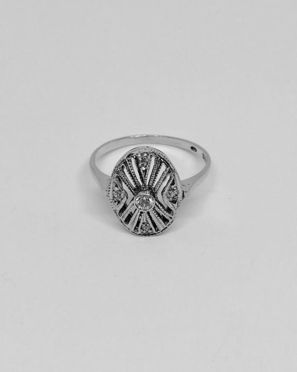 bague argent de forme ovale avec zircons art déco, vers 1930.