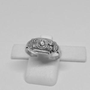 bague argent sertie clos zircon art déco vers 1930.