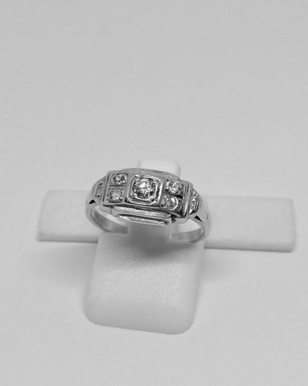 bague argent sertie clos zircon art déco vers 1930.