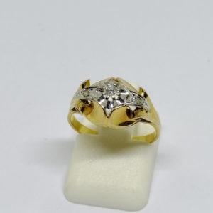 bague en or bicolore avec petit diamant vers 1920.