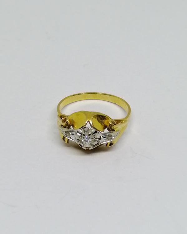 bague en or bicolore avec un petit diamant, vers 1920.