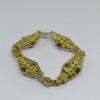 bracelet argent vermeil filigrané avec camées coquillage vers 1930.