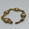 bracelet argent vermeil filigrané et camées coquillage vers 1930.