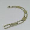 bracelet argent maillon rectangulaire et certains émaillés vers 1925.
